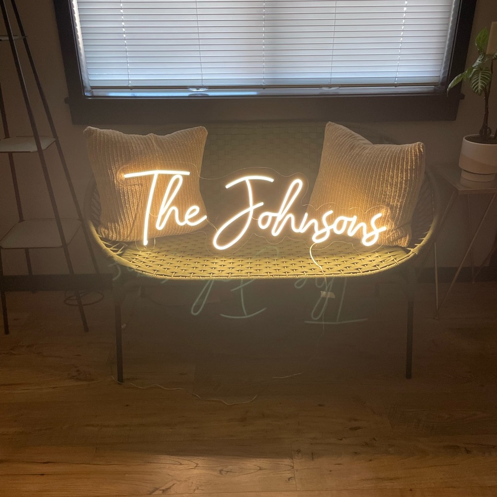 Golden Neon Sign Wall Decor with Cursive Font and Ambient Lighting